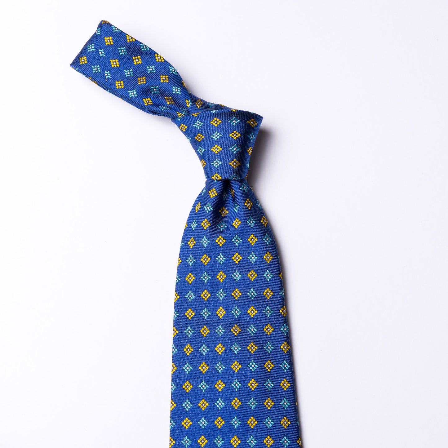 Blue woven silk tie with floral pattern