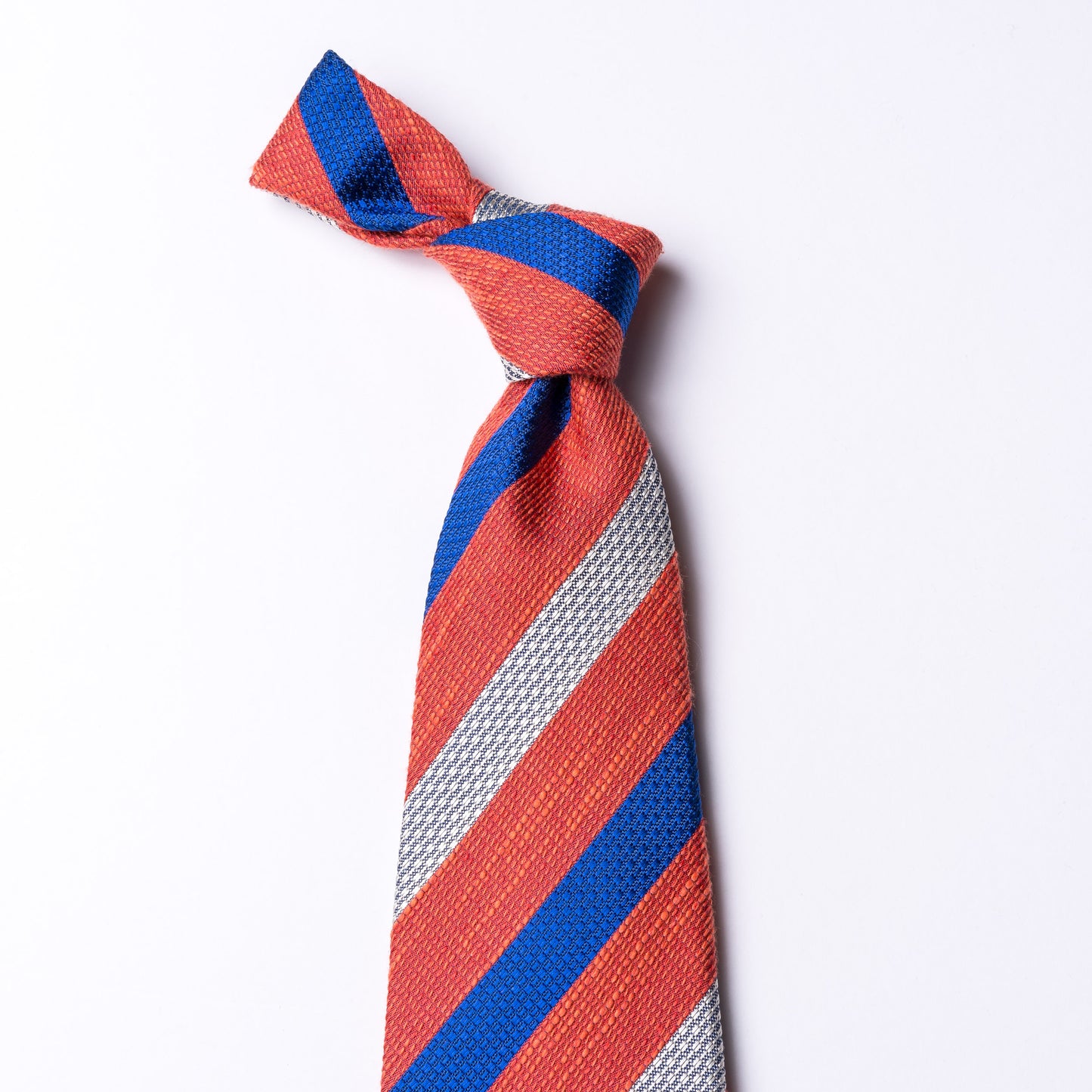 Striped tie in white - red - blue made of silk, cotton and linen