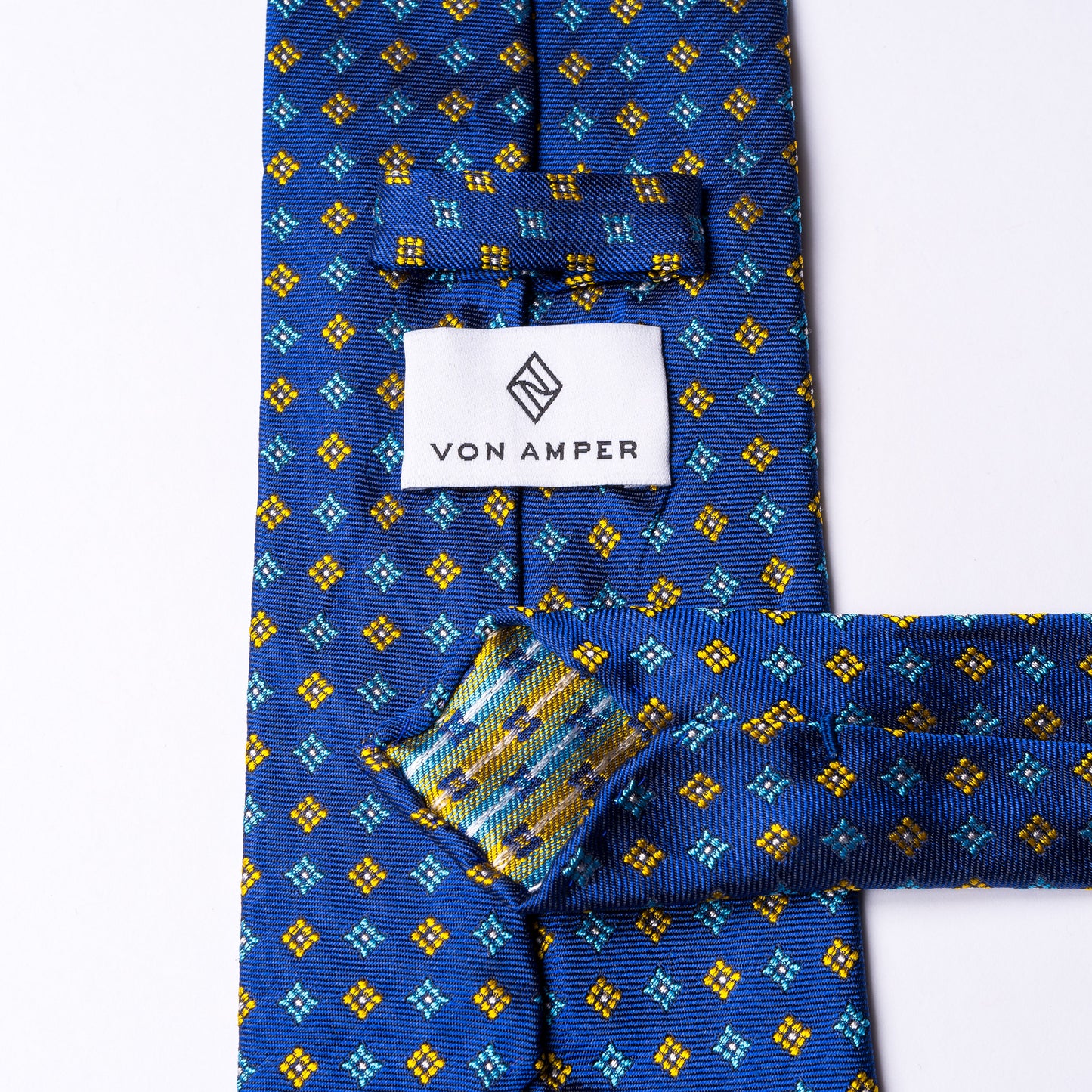 Blue woven silk tie with floral pattern