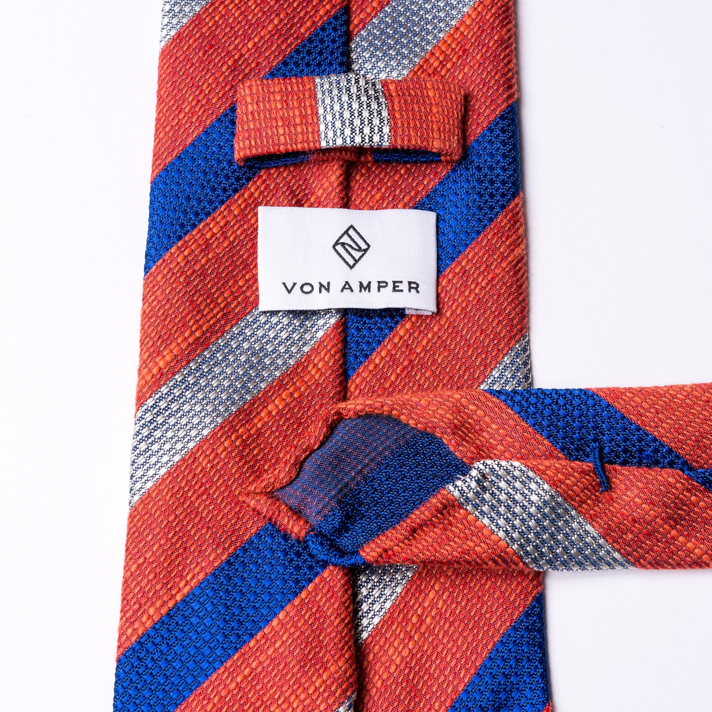 Striped tie in white - red - blue made of silk, cotton and linen