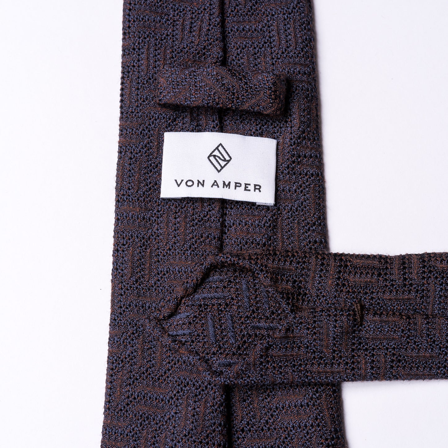 Brown tie with zig zag weave