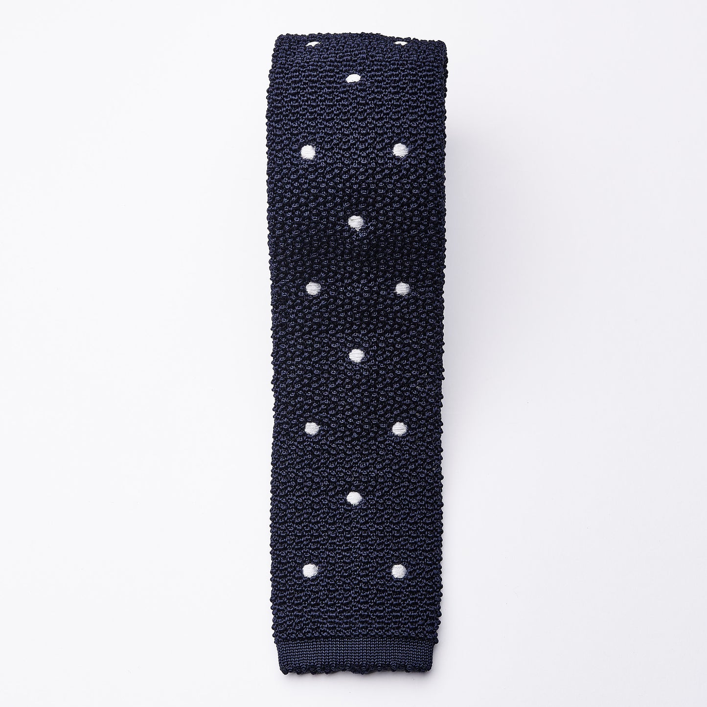 Knitted silk tie blue with white dots